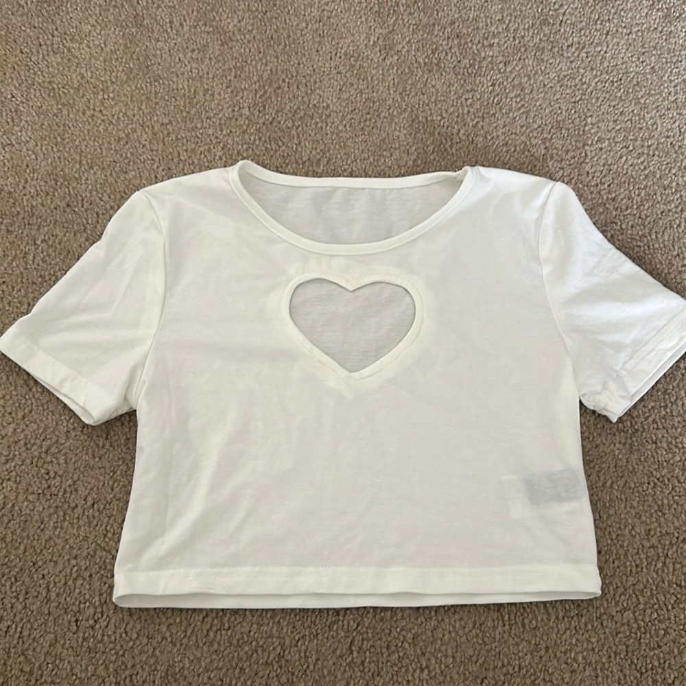 White crop top with heart cut out